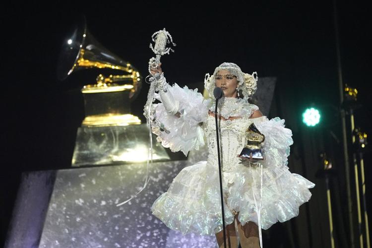Sparkle and color pop amid more subdued tones on Grammys red carpet