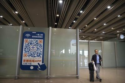 China won't require COVID-19 tests for incoming travelers in a milestone in its reopening