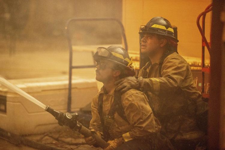 Firefighters make progress slowing wildfires while Los Angeles grapples with scope of devastation