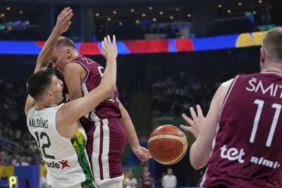 Doncic and Slovenia top Italy 89-85 for 7th place at Basketball World Cup. Latvia finishes 5th