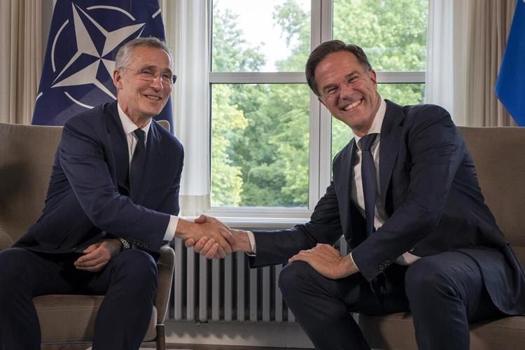 NATO's long-time chief hands over to a former Dutch premier