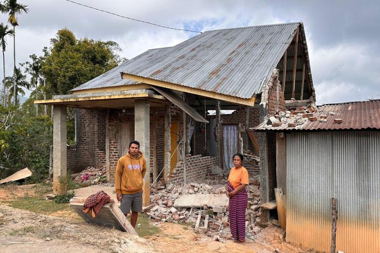 Rescuers dig through rubble and landslides after Indonesia quake kills 47