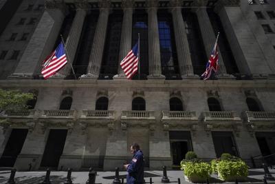 Stock market today: Wall Street slips after tepid report on economy