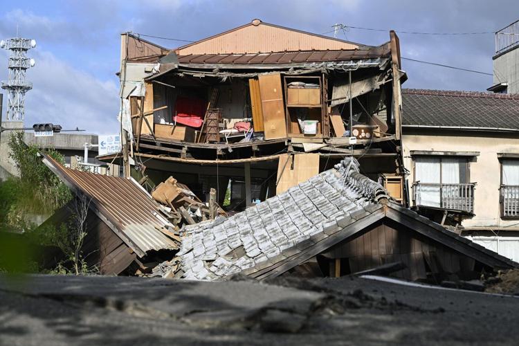 Rescuers search for the missing after Japan earthquake as death toll rises to 13