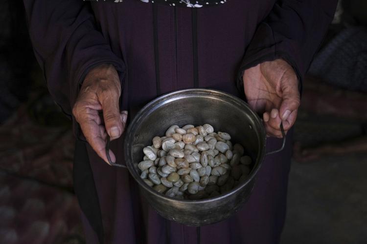 Mothers in Gaza stretch meager ingredients where they can, but say hunger persists