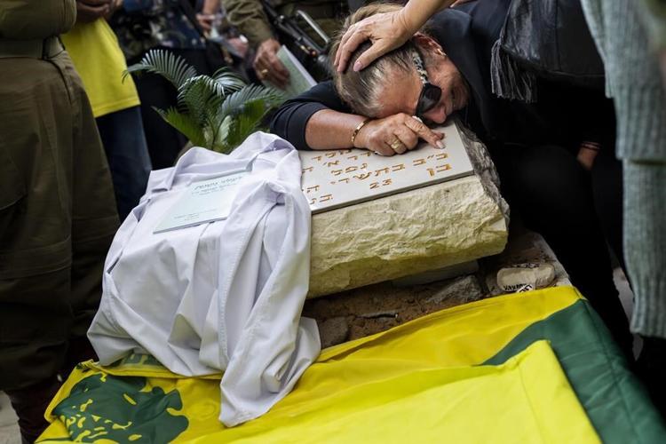 Medics and patients, including babies, stranded as battles rage around Gaza hospitals