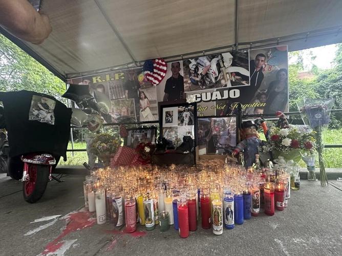 A motorcyclist died in a crash after a New York City police sergeant threw a cooler at his head