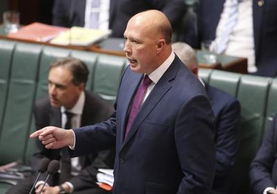 Australia's leader says opposition will renege on greenhouse gas emissions target if elected