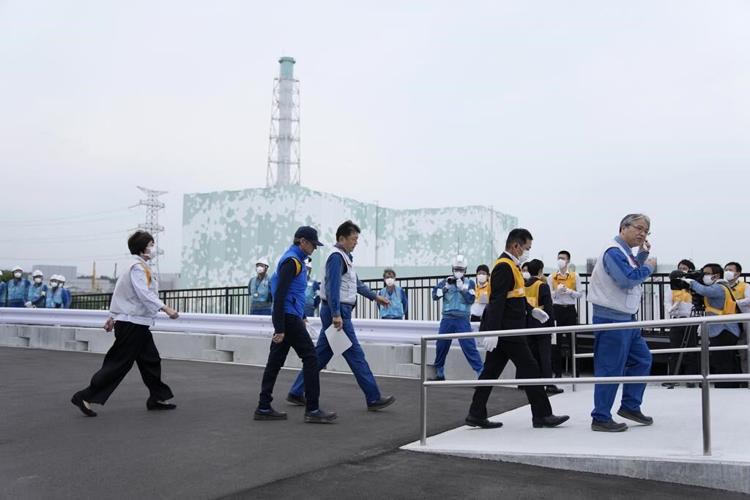 UN nuclear agency chief says he's satisfied with Japan's plans to release Fukushima wastewater