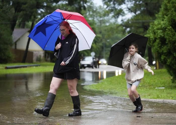 Some Houston-area residents are told to evacuate as waters rise from heavy rains