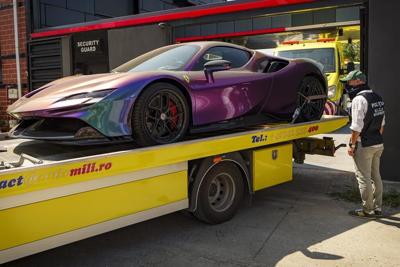 Romanian authorities tow vehicles from Andrew Tate’s home after new human trafficking allegations