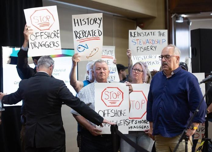 Newfoundland fishers protest interrupts environment ministers' press conference