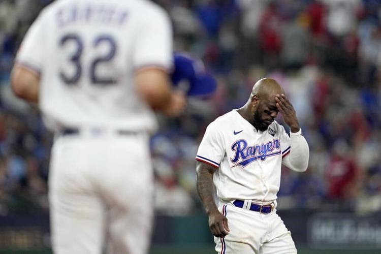 García's HR in 11th, Seager's tying shot in 9th rally Rangers past Arizona 6-5 in Series opener