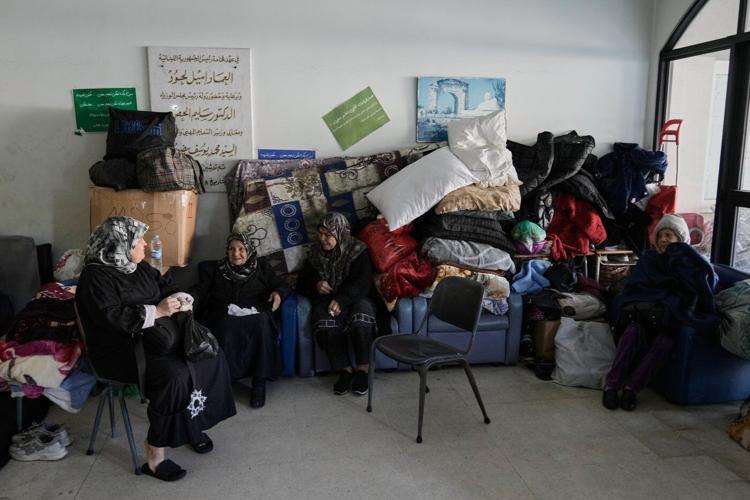 Photos of displaced civilians in Lebanon, where schools and stadiums turn into shelters during war