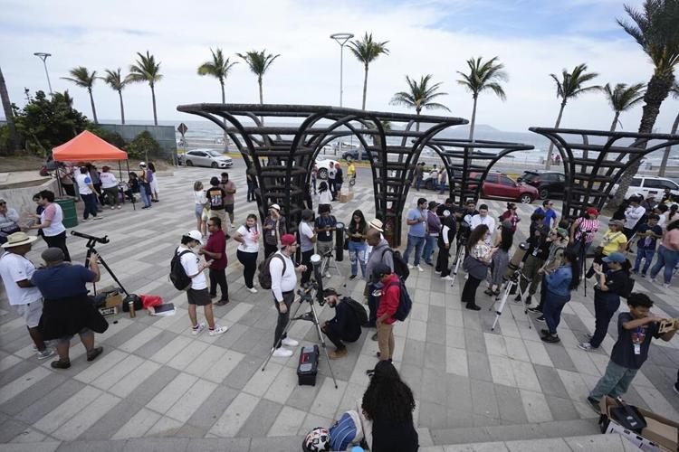 Weather is the hot topic as eclipse spectators stake out their spots in US, Mexico and Canada