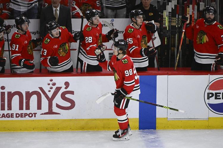 Pelletier scores twice as hot Flames beat Blackhawks 5-2