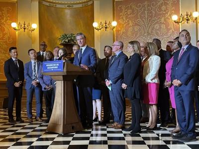 California Gov. Gavin Newsom signs a law aimed at preventing gas prices from spiking