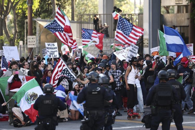 AP PHOTOS: Protests surge across US after Trump mobilizes troops