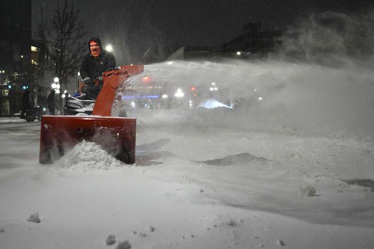 Winter storm with snow, ice, wind and bitter cold pummels much of the northern US