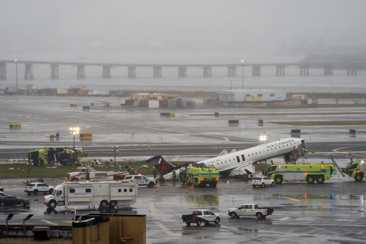 Photos show the scene of a collision on a runway at LaGuardia Airport in New York