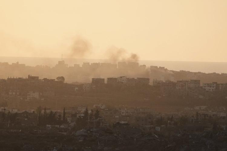 At least 23 people killed by Israeli strikes in Gaza as Israel lets minimal aid in