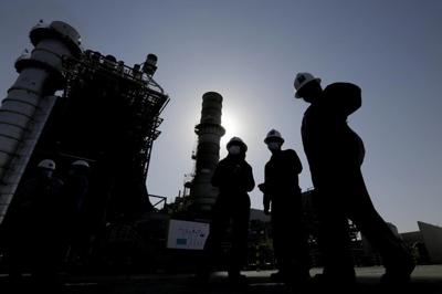 More oil producers join Saudis in surprise production cuts