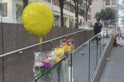 Hundreds honor security guard killed in New York office tower shooting