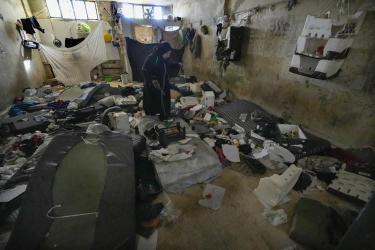 Thousands scour Syria's most horrific prison but find no sign of their loved ones