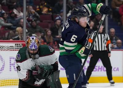 Horvat scores twice, Vancouver Canucks edge Arizona Coyotes 3-2 in OT