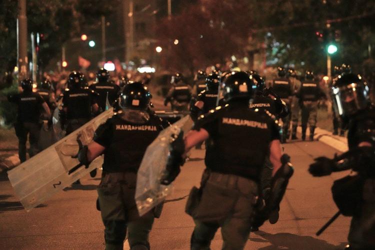 Police chase anti-government protesters in Serbia as president pledges crackdown