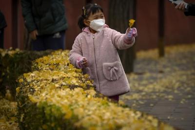 China tightens restrictions as rise in virus cases reported