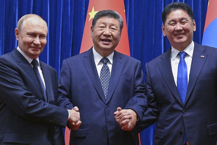 Xi and Putin reaffirm 'old friend' ties in the face of US challenges