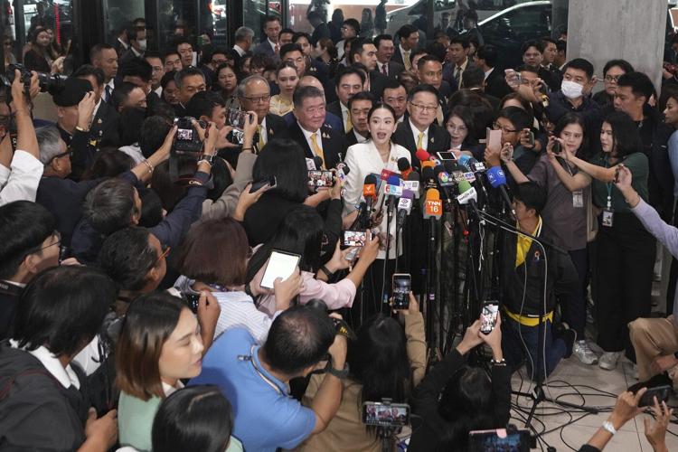 Thailand's prime minister faces a no-confidence vote over alleged influence by her father