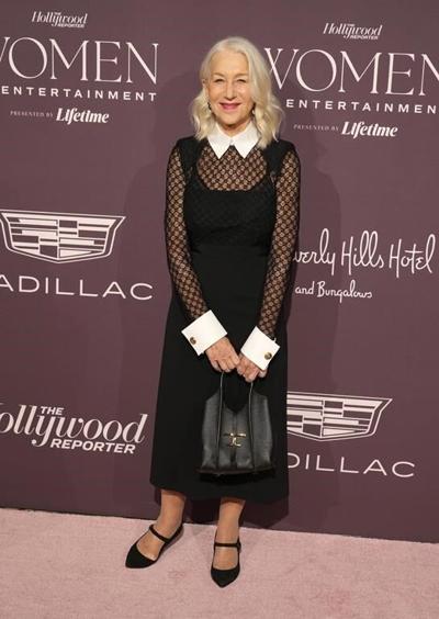 Adele praises influential women after being honored at THR's Women in Entertainment gala