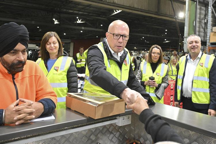 Australians vote in election with high prices and shortage of housing major issues