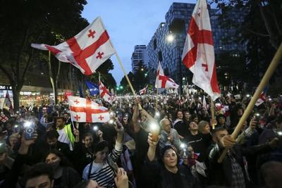 Georgian parliament committee rejects presidential veto of the divisive 'foreign agents' legislation