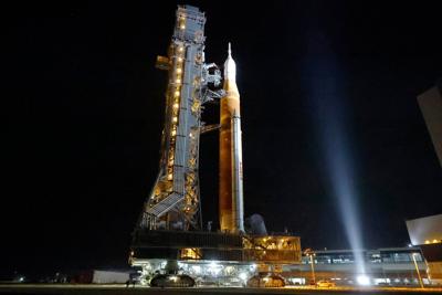 NASA hauls its repaired moon rocket from the hangar back to the pad for an early April launch