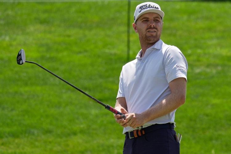 J.T. Poston handles the wind at Memorial for low round of tournament and the lead