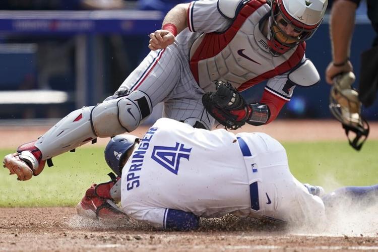 Correa's grand slam leads Twins past Blue Jays in 9-4 comeback victory