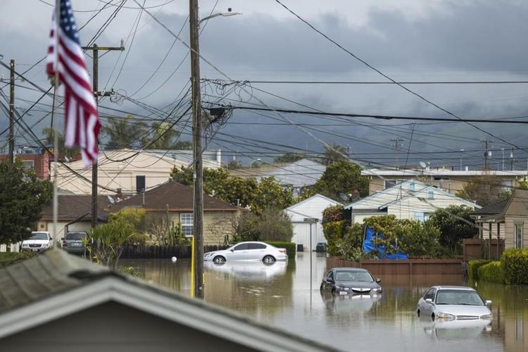 Storm breaches California river's levee, thousands evacuate