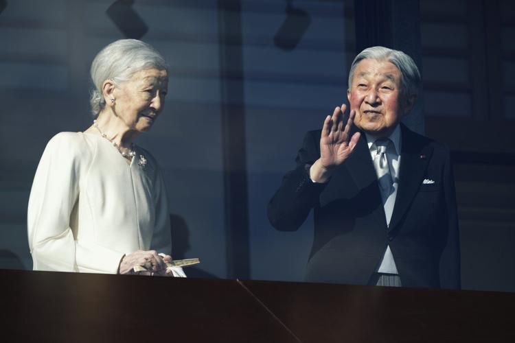 Japan's emperor and his family greet New Year well-wishers
