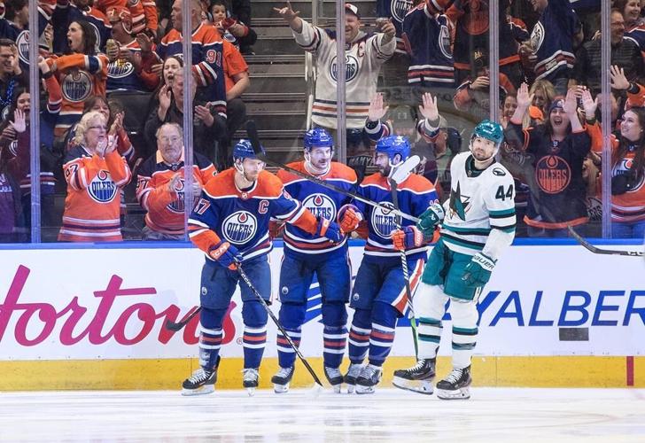 Oilers captain Connor McDavid records 100th assist of NHL season