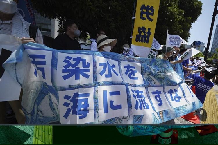 Japan defends neutrality of IAEA report on Fukushima water release plan as minister visits plant