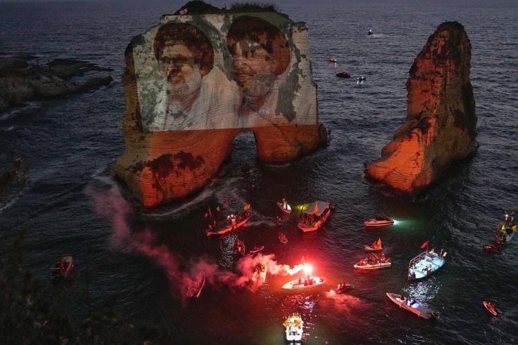 Photos show Hezbollah supporters honoring slain leaders Nasrallah and Safieddine despite PM's ban