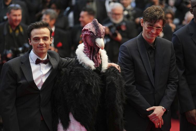 Bird man on red carpet leaves Cannes squawking