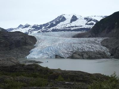 After a glacial dam outburst destroyed homes in Alaska, a look at the risks of melting ice masses
