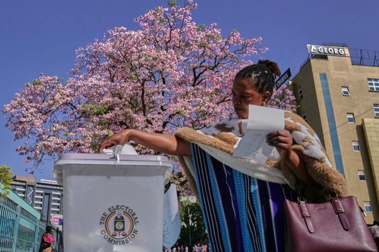 Photos show voters going to the polls in Uganda's presidential election