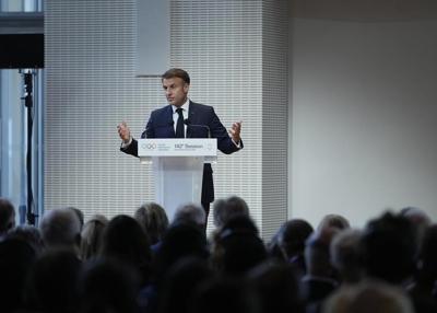 France's Macron says he'll keep the centrist caretaker government on through the Olympics