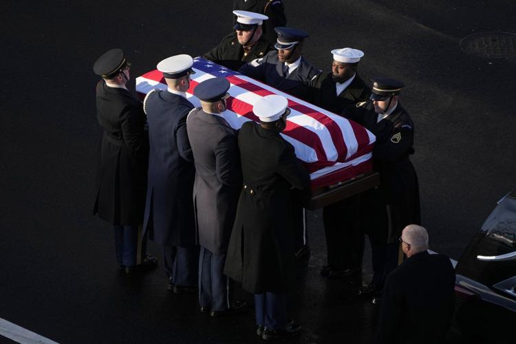 Jimmy Carter eulogized by Kamala Harris and others as 39th president returns to Washington