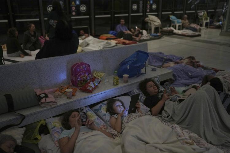 Fearful of Iranian missiles, many sleep in Israel's underground train stations